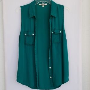 Beautiful soft green button-down sleeveless shirt